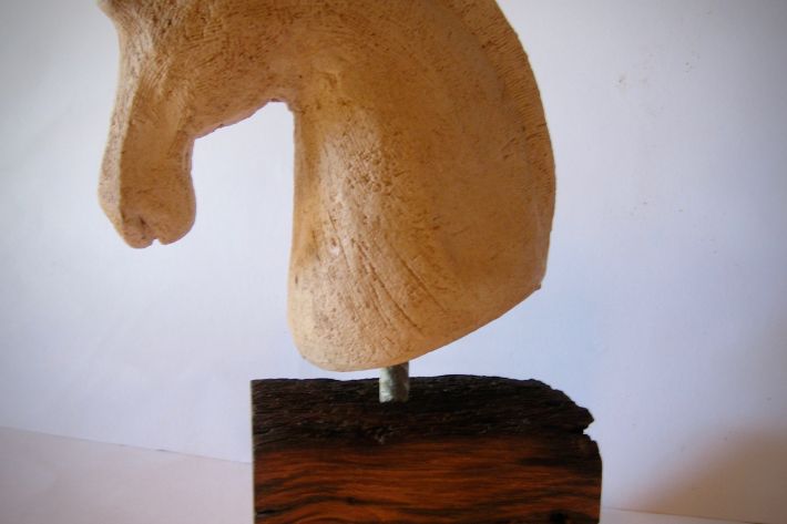 Horse sculpture mounted on ancient reclaimed oak