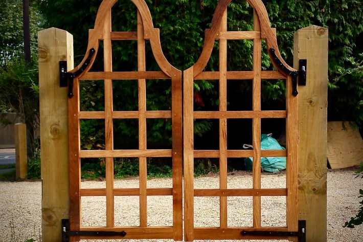 Handmade gates in oak for a Sussex Turner house