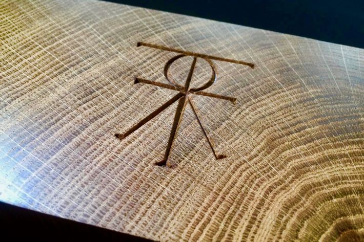 Carved logo - how we mark our furniture pieces