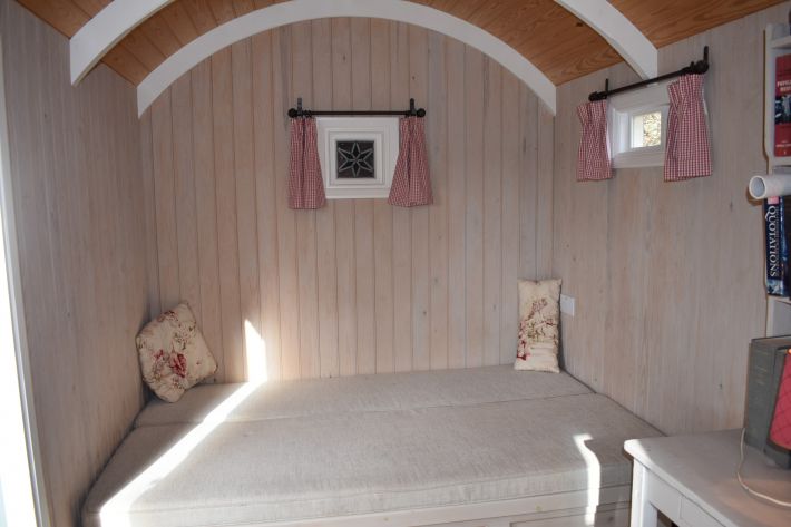 Shepherds Hut interior - daybed extended to double