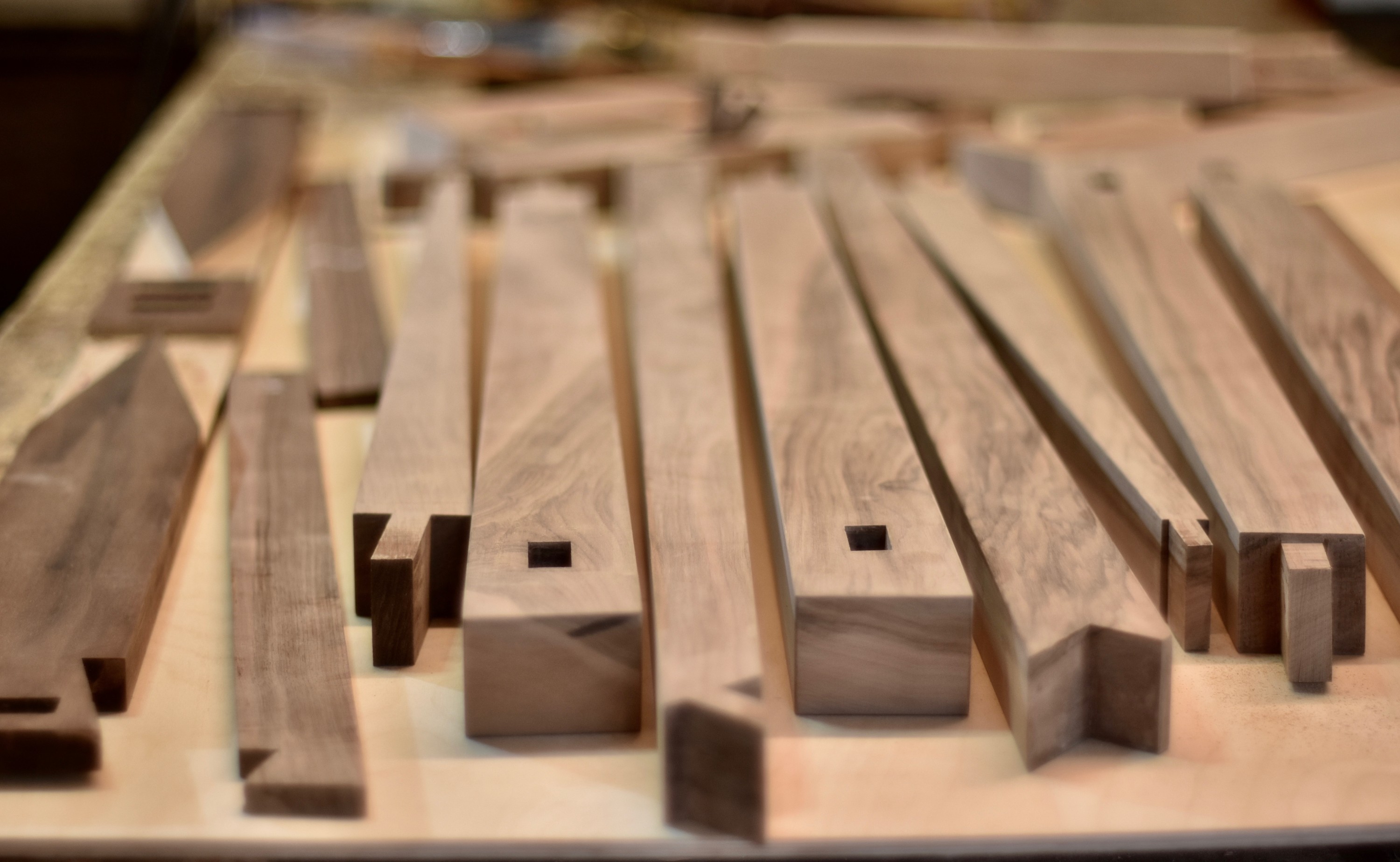 Walnut components of a console table